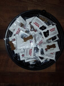 bucket of dog treat samples